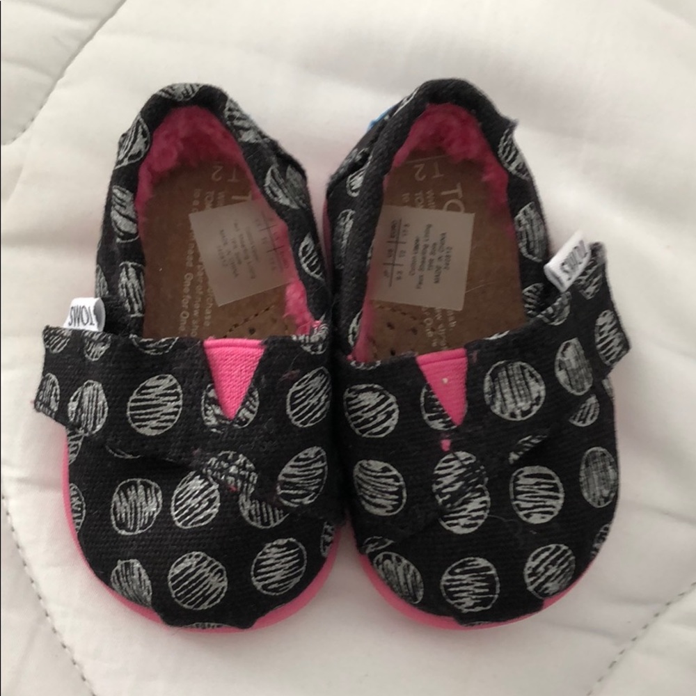 Never worn Toms size 2 infant shoes.
